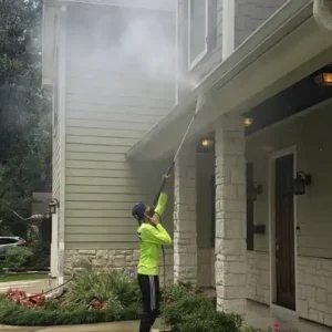 Pressure Washing exterior of a house