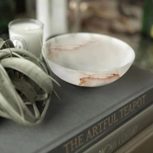 Tondo Alabaster Fruit Bowls arranged on a wooden table